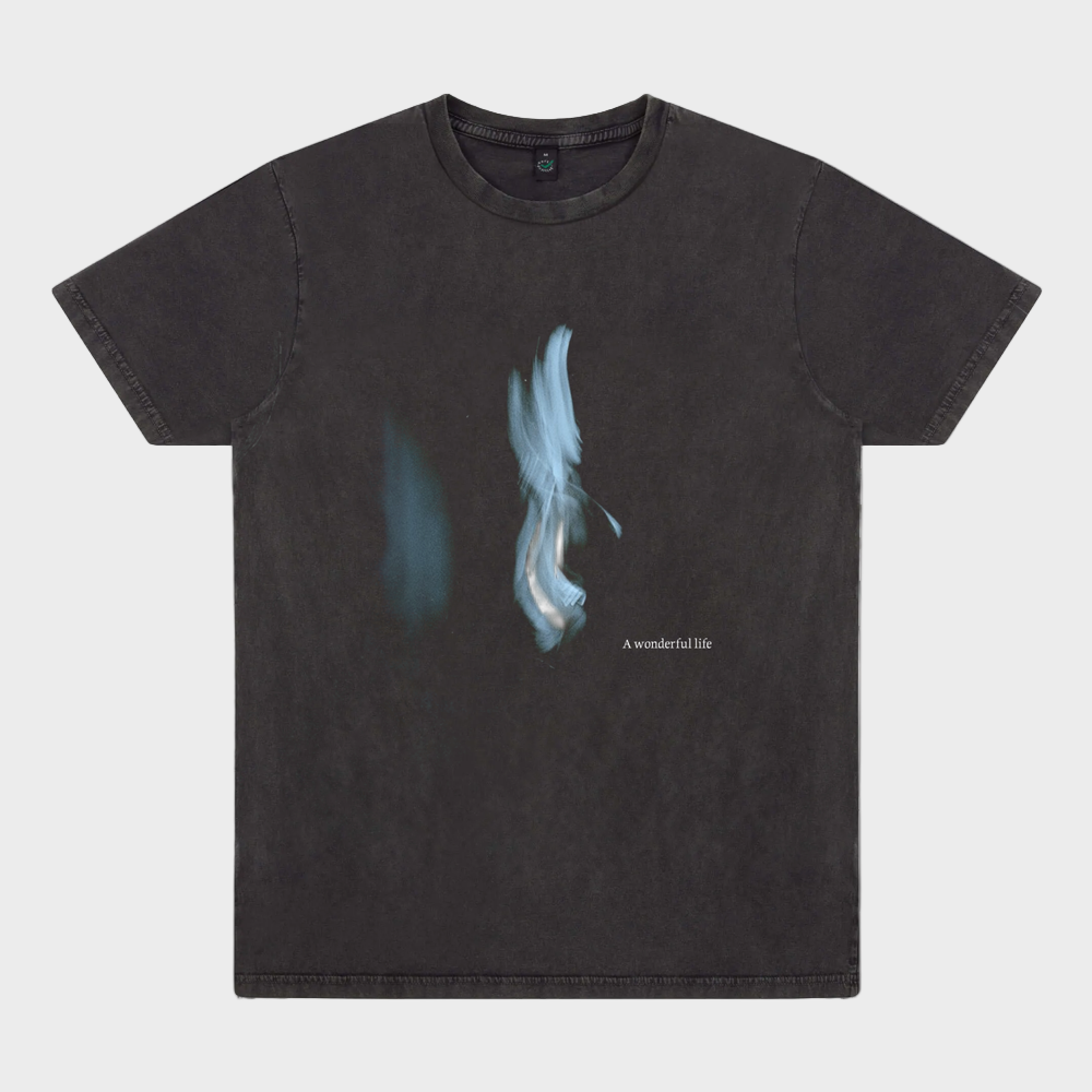 Black t-shirt with blue graphic design on a white background