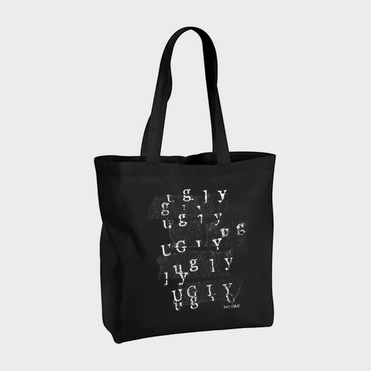 Black tote bag with white text 